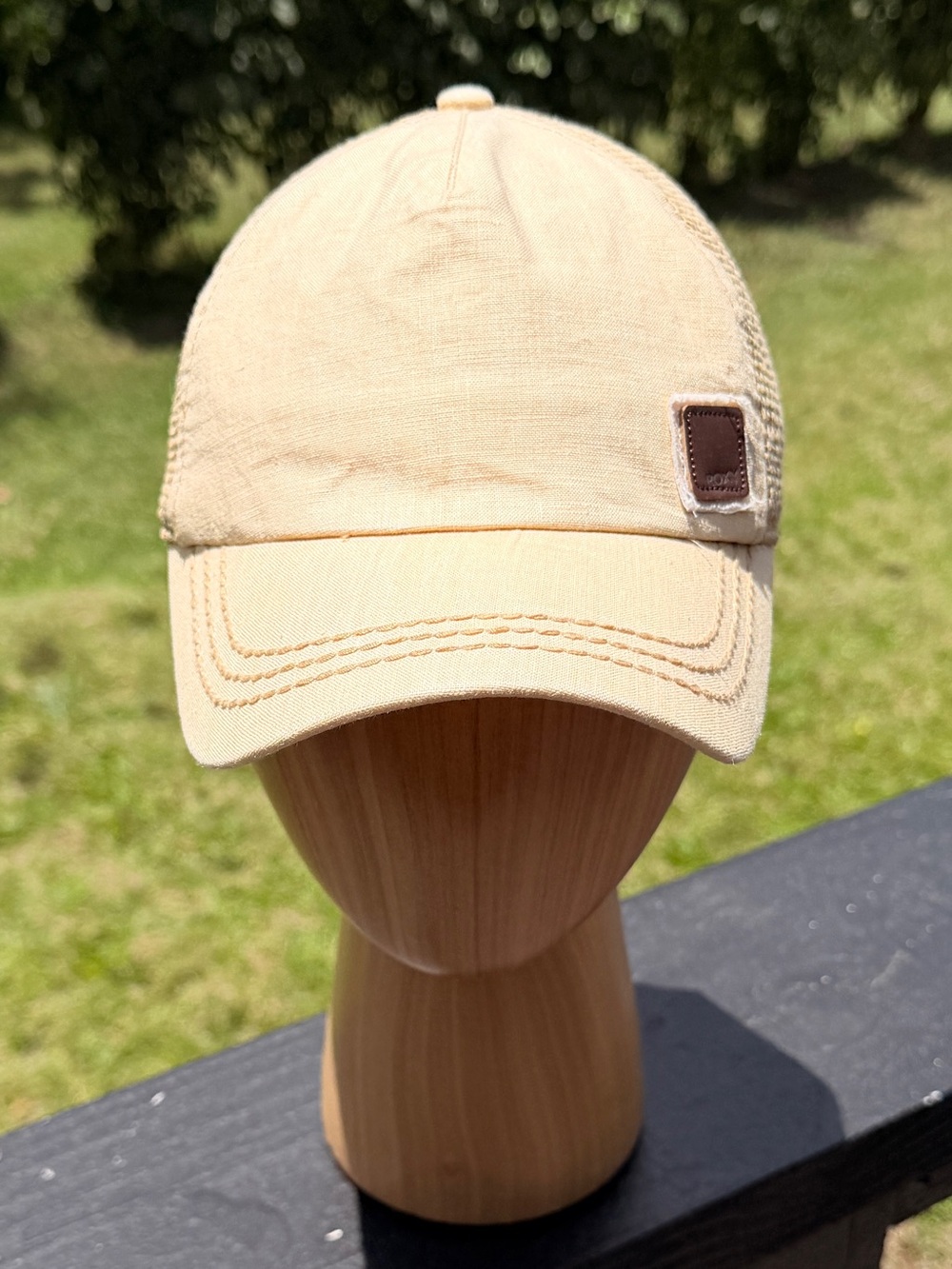Roxy tan cap with brown leather logo patch